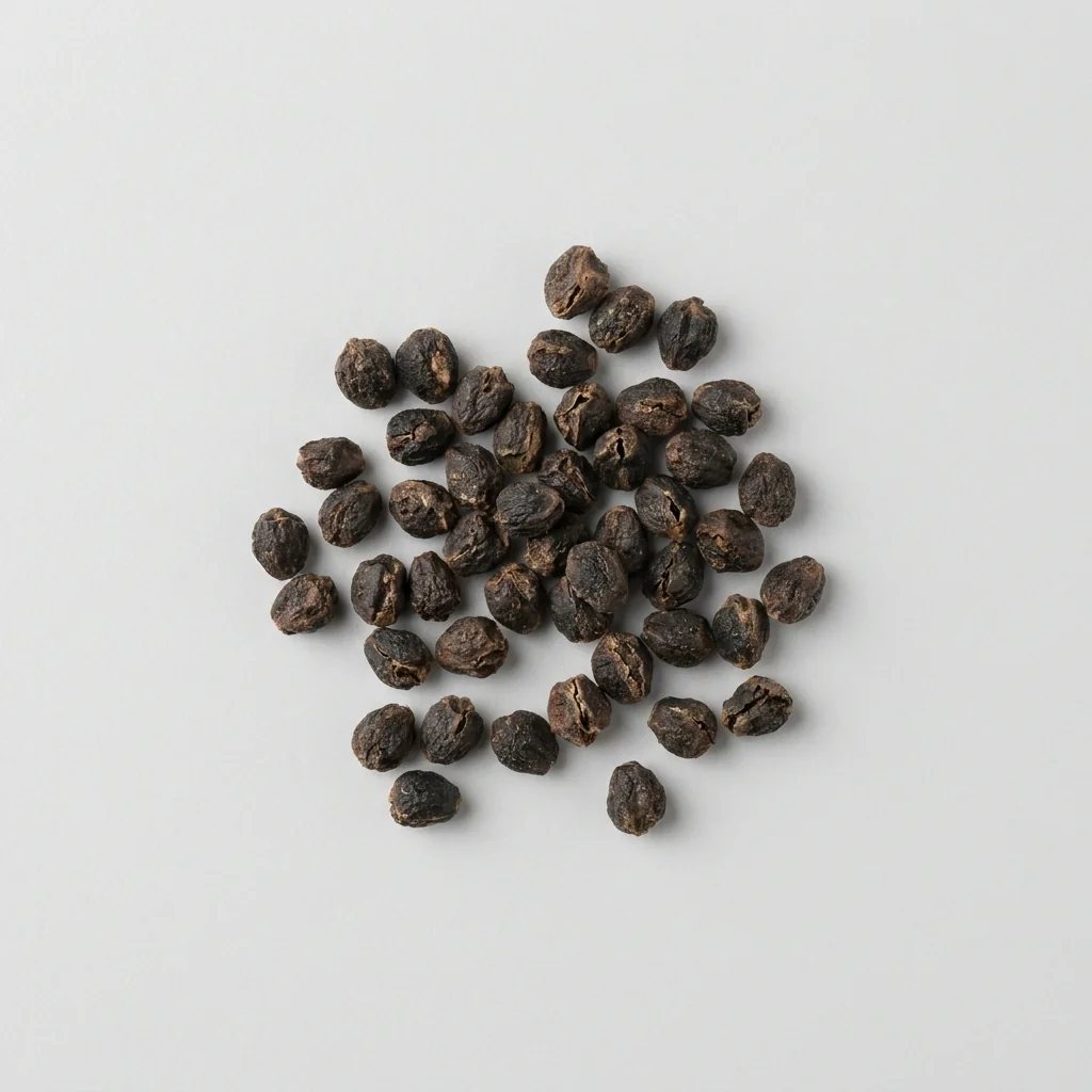 Granos de semillas seleccionadas de clavelon enano doble variado Tagetes patula con calibre uniforme y alta pureza fisica listos para la siembra en almácigo.
